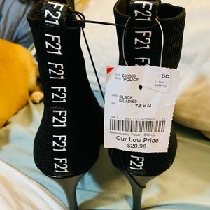 I’m selling high heel really cute boots! They are black. Brand is Forever 21